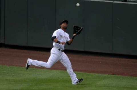 DENVER – JUNE 30: Centerfielder Willy Taveras #3 of the Colorado Rockies catches a fly ball against the San Diego Padres at Coors Field on June 30, 2008 in Denver, Colorado. The Padres defeated the Rockies 15-8. (Photo by Doug Pensinger/Getty Images)