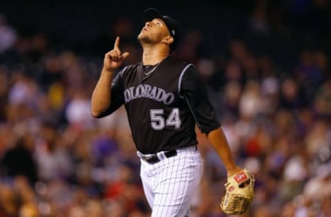 DENVER, CO – SEPTEMBER 5: Relief pitcher Carlos Esteves #54 of the Colorado Rockies points to the sky after striking out Hunter Pence of the San Francisco Giants to end the fifth inning at Coors Field on September 5, 2017 in Denver, Colorado. (Photo by Justin Edmonds/Getty Images)