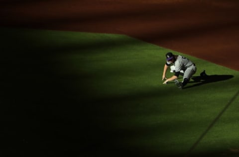 PHOENIX, AZ – OCTOBER 04: Starting pitcher Jon Gray #55 of the Colorado Rockies warms up before the start of the National League Wild Card game against the Arizona Diamondbacks at Chase Field on October 4, 2017 in Phoenix, Arizona. (Photo by Christian Petersen/Getty Images)