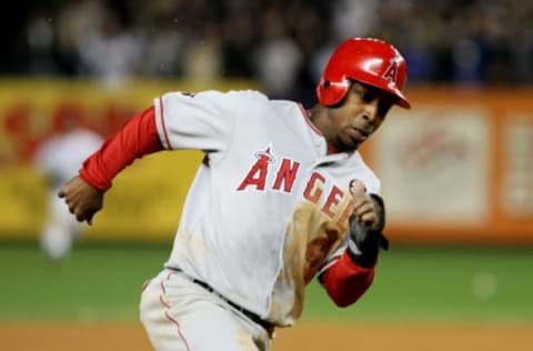 NEW YORK – OCTOBER 25: Chone Figgins #9 of the Los Angeles Angels of Anaheim rounds third base to score in the top of the eighth inning against the New York Yankees in Game Six of the ALCS during the 2009 MLB Playoffs at Yankee Stadium on October 25, 2009 in the Bronx borough of New York City. (Photo by Nick Laham/Getty Images)