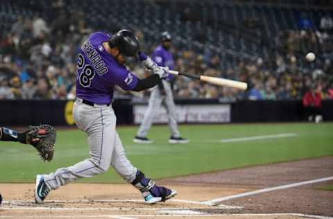 SAN DIEGO, CA – APRIL 4: Nolan Arenado #28 of the Colorado Rockies hits an RBI double during the first inning of a baseball game against the San Diego Padres at PETCO Park on April 4, 2018 in San Diego, California. (Photo by Denis Poroy/Getty Images)