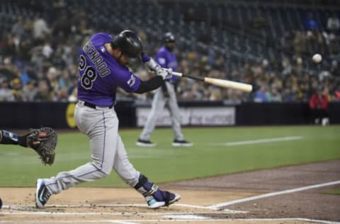 SAN DIEGO, CA – APRIL 4: Nolan Arenado #28 of the Colorado Rockies hits an RBI double during the first inning of a baseball game against the San Diego Padres at PETCO Park on April 4, 2018 in San Diego, California. (Photo by Denis Poroy/Getty Images)