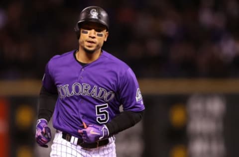 DENVER, CO – APRIL 09: Carlos Gonzalez #5 of the Colorado Rockies circles the bases after hitting a 2 RBI home run in the sixth inning against the San Diego Padres at Coors Field on April 9, 2018 in Denver, Colorado. (Photo by Matthew Stockman/Getty Images)