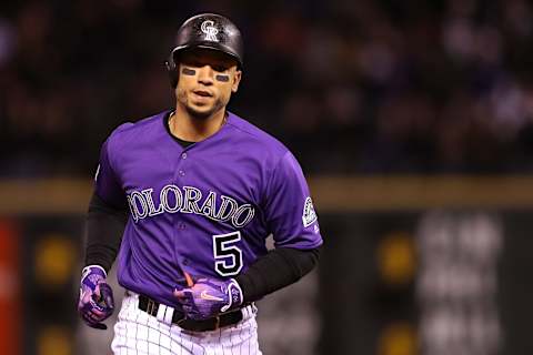 DENVER, CO – APRIL 09: Carlos Gonzalez #5 of the Colorado Rockies circles the bases after hitting a 2 RBI home run in the sixth inning against the San Diego Padres at Coors Field on April 9, 2018 in Denver, Colorado. (Photo by Matthew Stockman/Getty Images)