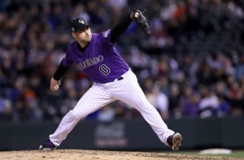 DENVER, CO – APRIL 09: Pitcher Adam Ottavino #0 of the Colorado Rockies throws in the ninth inning against the San Diego Padres at Coors Field on April 9, 2018 in Denver, Colorado. (Photo by Matthew Stockman/Getty Images)