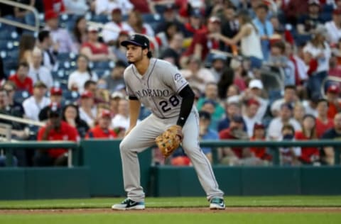 WASHINGTON, DC – APRIL 13: Nolan Arenado #28 of the Colorado Rockies follows the ball against the Washington Nationals at Nationals Park on April 13, 2018 in Washington, DC. (Photo by Rob Carr/Getty Images)