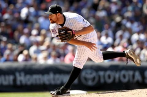 DENVER, CO – APRIL 22: Pitcher Bryan Shaw #29 of the Colorado Rockies throws in the sixth inning against the Chicago Cubs at Coors Field on April 22, 2018 in Denver, Colorado. (Photo by Matthew Stockman/Getty Images)