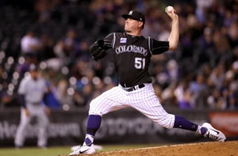 DENVER, CO – APRIL 23: Pitcher Jake McGee #52 of the Colorado Rockies throws in the seventh inning against the San Diego Padres at Coors Field on April 23, 2018 in Denver, Colorado. (Photo by Matthew Stockman/Getty Images)