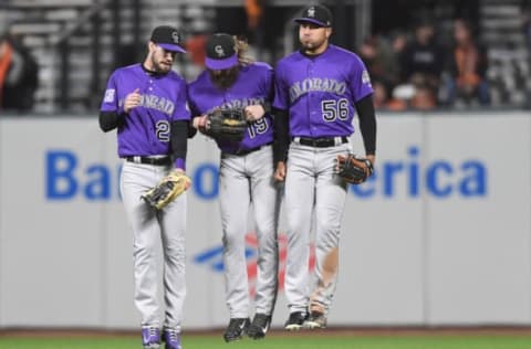 SAN FRANCISCO, CA – MAY 18: (L-R) David Dahl #26, Charlie Blackmon #19 and Noel Cuevas #56 of the Colorado Rockies celebrates defeating the San Francisco Giants 6-1 at AT&T Park on May 18, 2018 in San Francisco, California. (Photo by Thearon W. Henderson/Getty Images)