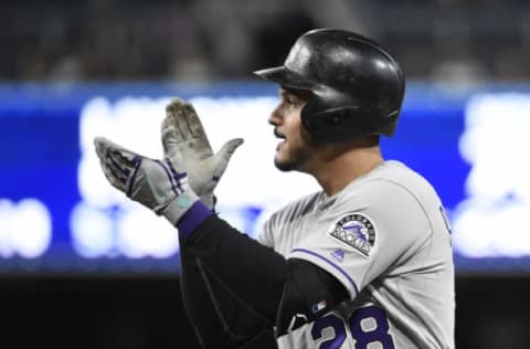 SAN DIEGO, CA – MAY 14: Nolan Arenado #28 of the Colorado Rockies claps after hitting an RBI single during the third inning of a baseball game against the San Diego Padres at PETCO Park on May 14, 2018 in San Diego, California. (Photo by Denis Poroy/Getty Images)