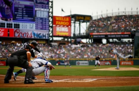 DENVER, CO – JUNE 3: Nolan Arenado #28 of the Colorado Rockies hits a RBI double off of Alex Wood #57 of the Los Angeles Dodgers during the first inning at Coors Field on June 3, 2018 in Denver, Colorado. (Photo by Justin Edmonds/Getty Images)