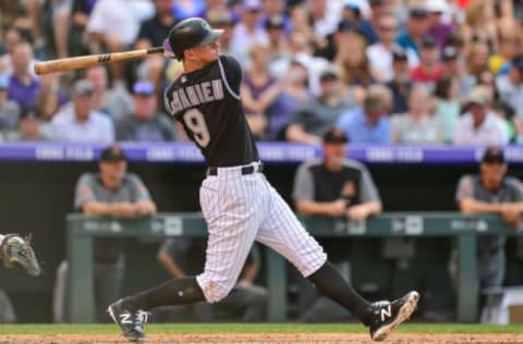 DENVER, CO – JUNE 9: DJ LeMahieu #9 of the Colorado Rockies hits a 2-run homerun in the fourth inning of a game against the Arizona Diamondbacks at Coors Field on June 9, 2018 in Denver, Colorado. (Photo by Dustin Bradford/Getty Images)