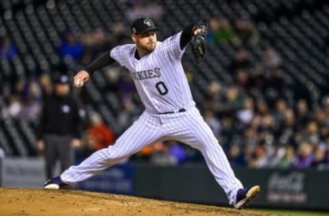 DENVER, CO – JUNE 19: Adam Ottavino #0 of the Colorado Rockies pitches against the New York Mets in the seventh inning of a game at Coors Field on June 19, 2018 in Denver, Colorado. (Photo by Dustin Bradford/Getty Images)