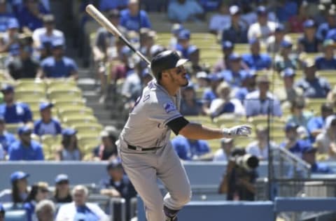 LOS ANGELES, CA – JULY 01: Nolan Arenado #28 of the Colorado Rockies watches his home run ball in the fifth inning against the Los Angeles Dodgers at Dodger Stadium on July 1, 2018 in Los Angeles, California. (Photo by John McCoy/Getty Images)