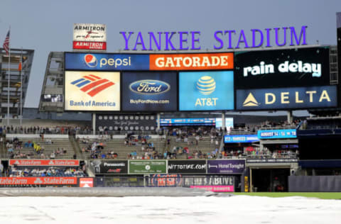 NEW YORK, NY – JULY 27: The game between the New York Yankees and the Kansas City Royals is delayed due to rain at Yankee Stadium on July 27, 2018 in the Bronx borough of New York City. (Photo by Elsa/Getty Images)