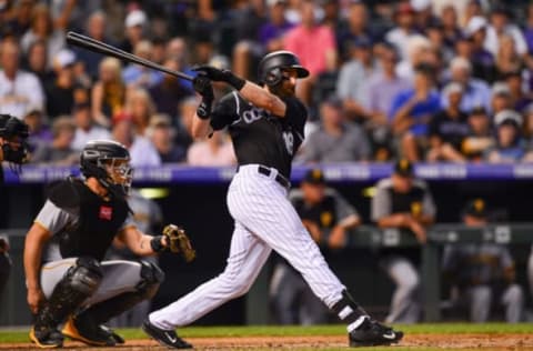 DENVER, CO – AUGUST 7: Charlie Blackmon #19 of the Colorado Rockies follows through on a swing for his 1,000th career hit – a sixth inning single – against the Pittsburgh Pirates at Coors Field on August 7, 2018 in Denver, Colorado. (Photo by Dustin Bradford/Getty Images)