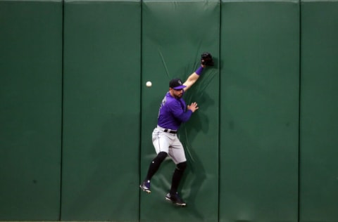 PITTSBURGH, PA - MAY 23: Randal Grichuk #15 of the Colorado Rockies can't make the catch on a triple in the fourth inning against the Pittsburgh Pirates during the game at PNC Park on May 23, 2022 in Pittsburgh, Pennsylvania. (Photo by Justin K. Aller/Getty Images)