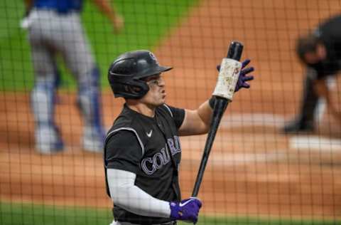 DENVER, CO – AUGUST 14: Tony Wolters #14 of the Colorado Rockies prepares to bat against the Texas Rangers at Coors Field on August 14, 2020 in Denver, Colorado. (Photo by Dustin Bradford/Getty Images)