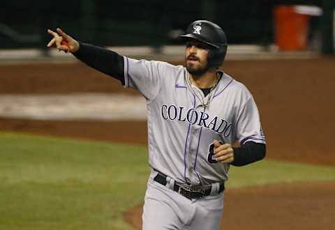 PHOENIX, ARIZONA – SEPTEMBER 26: Josh Fuentes #8 of the Colorado Rockies gestures toward the stands after scoring a run against the Arizona Diamondbacks on an RBI single by Daniel Murphy #9 during the fourth inning of the MLB game at Chase Field on September 26, 2020 in Phoenix, Arizona. (Photo by Ralph Freso/Getty Images)