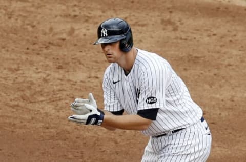 NEW YORK, NEW YORK – SEPTEMBER 26: (NEW YORK DAILIES OUT) DJ LeMahieu #26 of the New York Yankees reacts after his sixth inning two run double against the Miami Marlins at Yankee Stadium on September 26, 2020 in New York City. The Yankees defeated the Marlins 11-4. (Photo by Jim McIsaac/Getty Images)