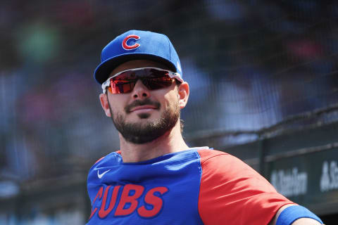 CHICAGO, ILLINOIS – JULY 29: Kris Bryant #17 of the Chicago Cubs looks on from the dugout during the game against the Cincinnati Reds at Wrigley Field on July 29, 2021 in Chicago, Illinois. (Photo by Quinn Harris/Getty Images)