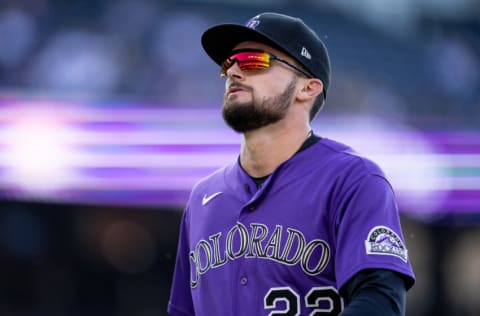 DENVER, COLORADO - APRIL 30: Sam Hilliard #22 of the Colorado Rockies heads to the dugout in between innings against the Cincinnati Reds at Coors Field on April 30, 2022 in Denver, Colorado.(Photo by Kyle Cooper/Colorado Rockies/Getty Images)