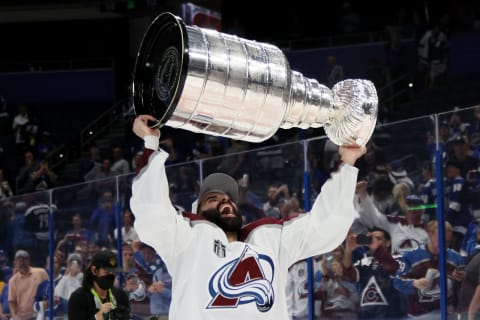 TAMPA, FLORIDA – JUNE 26: Nazem Kadri #91 of the Colorado Avalanche lifts the Stanley Cup after defeating the Tampa Bay Lightning 2-1 in Game Six of the 2022 NHL Stanley Cup Final at Amalie Arena on June 26, 2022 in Tampa, Florida. (Photo by Bruce Bennett/Getty Images)