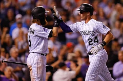 DENVER, CO – SEPTEMBER 4: Ryan McMahon #24 of the Colorado Rockies celebrates his solo home run with Charlie Blackmon #19 during the seventh inning against the San Francisco Giants at Coors Field on September 4, 2018 in Denver, Colorado. (Photo by Justin Edmonds/Getty Images)