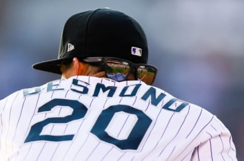 DENVER, CO – JULY 10: The stands are reflected in the glasses of Ian Desmond #20 of the Colorado Rockies during the third inning against the Arizona Diamondbacks at Coors Field on July 10, 2018 in Denver, Colorado. (Photo by Justin Edmonds/Getty Images)