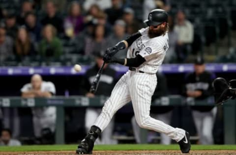 DENVER, COLORADO – MAY 03: Charlie Blackmon #19 of the Colorado Rockies hits a 2 RBI home run in the ninth inning against the Arizona Diamondbacks at Coors Field on May 03, 2019 in Denver, Colorado. (Photo by Matthew Stockman/Getty Images)