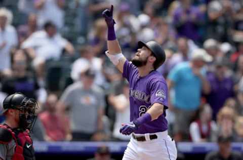 DENVER, COLORADO – MAY 30: David Dahl #26 of the Colorado Rockies celebrates as he crosses the plate after hitting a two-run home run run in the second inning against the Arizona Diamondbacks at Coors Field on May 30, 2019 in Denver, Colorado. (Photo by Matthew Stockman/Getty Images)