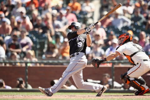 SAN FRANCISCO, CA – JUNE 28: DJ LeMahieu #9 of the Colorado Rockies hits a two-run home run in the ninth inning against the San Francisco Giants at AT&T Park on June 28, 2018 in San Francisco, California. (Photo by Ezra Shaw/Getty Images)