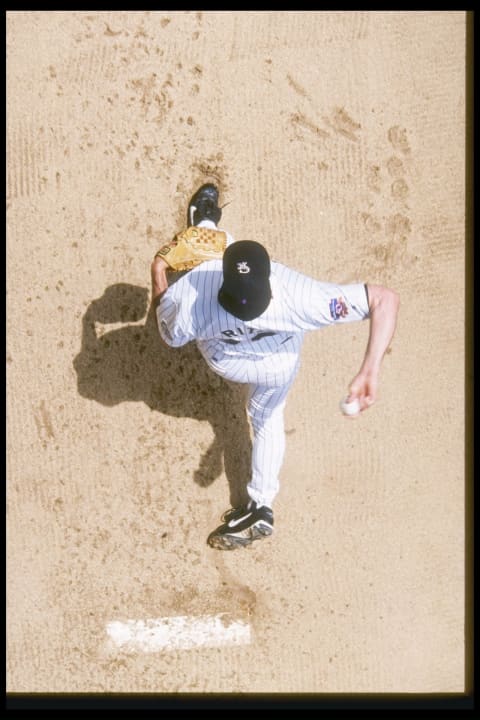 5 Jun 1997: Pitcher Kevin Ritz of the Colorado Rockies warms up in the bullpen at Coors Field in Denver, Colorado. (Mandatory Credit: Brian Bahr /Allsport)