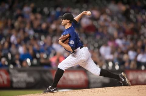 DENVER, CO – SEPTEMBER 15: Matt Belisle #34 of the Colorado Rockies pitches against the Los Angeles Dodgers during a game at Coors Field on September 15, 2014 in Denver, Colorado. (Photo by Dustin Bradford/Getty Images)