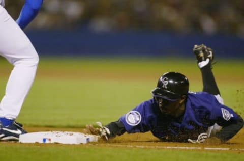 6 Apr 2002: Juan Pierre #9 of the Colorado Rockies versus the Los Angeles Dodgers at Dodger Stadium in Los Angeles, California. (Mandatory Credit: Stephen Dunn/Getty Images)