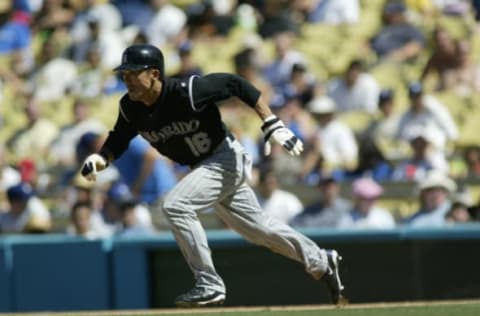 LOS ANGELES – SEPTEMBER 3: Kazuo Matsui of the Colorado Rockies attempts to steal second base during the game against the Los Angeles Dodgers at Dodger Stadium in Los Angeles, California on September 3, 2006. The Rockies defeated the Dodgers 12-5. (Photo by Rob Leiter/MLB Photos via Getty Images)