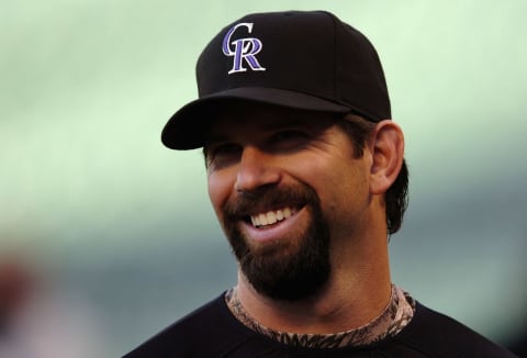 DENVER – OCTOBER 06: Todd Helton #17 of the Colorado Rockies smiles as he warms up before Game Three of the National League Divisional Series against the Philadelphia Phillies at Coors Field on October 6, 2007 in Denver, Colorado (Photo by Steve Dykes/Getty Images)