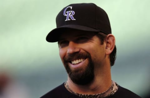 DENVER – OCTOBER 06: Todd Helton #17 of the Colorado Rockies smiles as he warms up before Game Three of the National League Divisional Series against the Philadelphia Phillies at Coors Field on October 6, 2007, in Denver, Colorado (Photo by Steve Dykes/Getty Images)