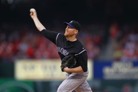 ST. LOUIS, MO – AUGUST 12: Aaron Cook #28 of the Colorado Rockies pitches against the St. Louis Cardinals at Busch Stadium on August 12, 2011 in St. Louis, Missouri. (Photo by Dilip Vishwanat/Getty Images)