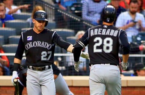 May 5, 2018; New York City, NY, USA; Colorado Rockies third baseman Nolan Arenado (28) is congratulated by Colorado Rockies shortstop Trevor Story (27) after hitting a solo home run against the New York Mets during the first inning at Citi Field. Mandatory Credit: Andy Marlin-USA TODAY Sports