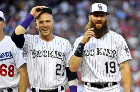 Jul 17, 2018; Washington, DC, USA; National League infielder Trevor Story of the Colorado Rockies (27) and National League infielder Joey Votto of the Cincinnati Reds (19) before the 2018 MLB All Star Game at Nationals Ballpark. Mandatory Credit: Brad Mills-USA TODAY Sports