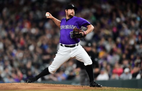 Apr 23, 2019; Denver, CO, USA; Colorado Rockies relief pitcher Bryan Shaw (29) delivers a pitch in the seventh inning against the Washington Nationals at Coors Field. Mandatory Credit: Ron Chenoy-USA TODAY Sports