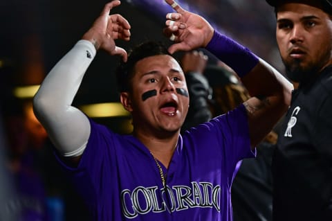 Aug 28, 2019; Denver, CO, USA; Colorado Rockies center fielder Yonathan Daza (31) reacts in the dugout in the fourth inning against the Boston Red Sox at Coors Field. Mandatory Credit: Ron Chenoy-USA TODAY Sports