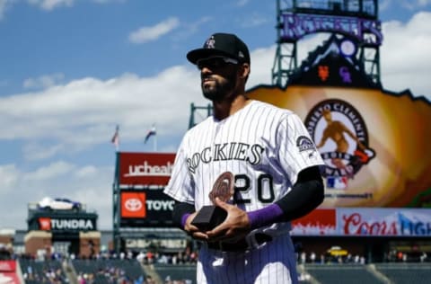 Sep 18, 2019; Denver, CO, USA; Colorado Rockies left fielder Ian Desmond (20) accepts the Roberto Clemente Award before a game against the New York Mets at Coors Field. Mandatory Credit: Isaiah J. Downing-USA TODAY Sports