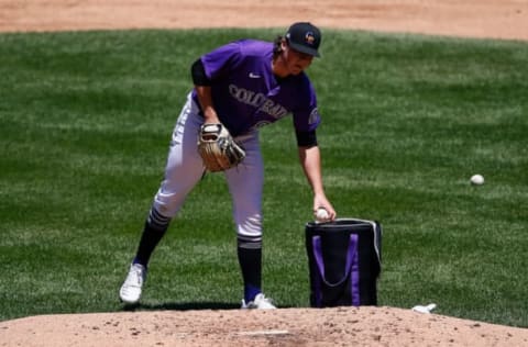 Jul 8, 2020; Denver, Colorado, United States; Colorado Rockies pitcher Ryan Rolison (80) grabs a fresh ball during workouts at Coors Field. Mandatory Credit: Isaiah J. Downing-USA TODAY Sports