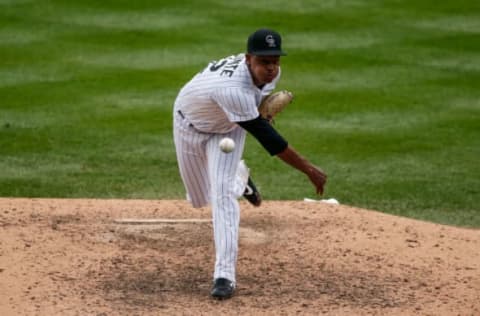 Aug 12, 2020; Denver, Colorado, USA; Colorado Rockies relief pitcher Yency Almonte (62) pitches in the seventh inning against the Arizona Diamondbacks at Coors Field. Mandatory Credit: Isaiah J. Downing-USA TODAY Sports