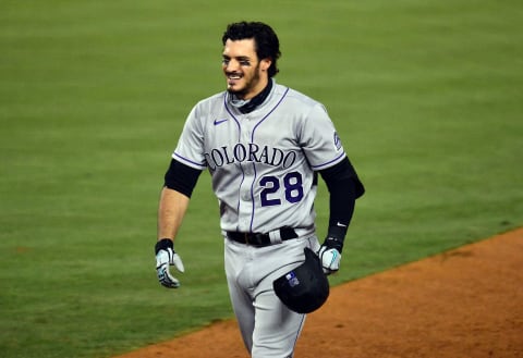 August 21, 2020; Los Angeles, California, USA; Colorado Rockies third baseman Nolan Arenado (28) reacts after the sixth inning against the Los Angeles Dodgers at Dodger Stadium. Mandatory Credit: Gary A. Vasquez-USA TODAY Sports