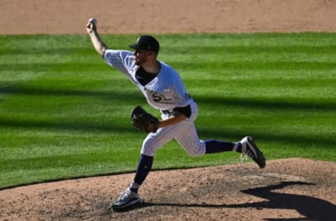 Sep 2, 2020; Denver, Colorado, USA; Colorado Rockies relief pitcher Daniel Bard (52) delivers a pitch against the San Francisco Giants in the ninth inning at Coors Field. Mandatory Credit: Ron Chenoy-USA TODAY Sports