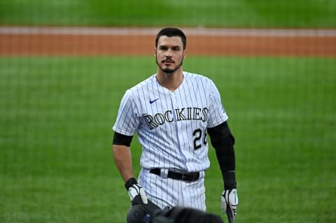 Sep 12, 2020; Denver, Colorado, USA; Colorado Rockies third baseman Nolan Arenado (28) reacts following his strikeout in the first inning against the Los Angeles Angels at Coors Field. Mandatory Credit: Ron Chenoy-USA TODAY Sports