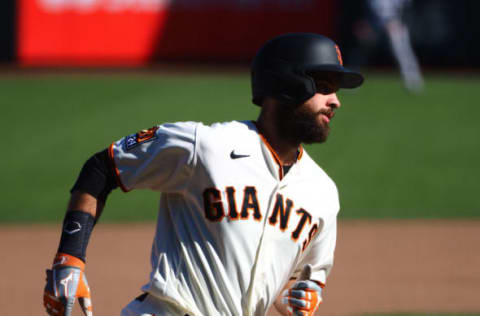 Sep 24, 2020; San Francisco, California, USA; San Francisco Giants first baseman Brandon Belt (9) runs the bases after hitting a solo home run against the Colorado Rockies during the eighth inning at Oracle Park. Mandatory Credit: Kelley L Cox-USA TODAY Sports